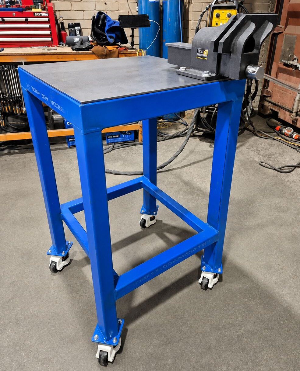 Blue steel welding bench in workshop